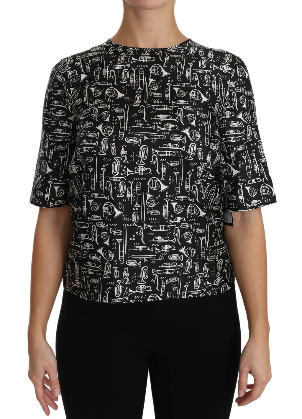 Blouse en soie noire Dolce & Gabbana avec imprimé d'instruments de musique, style élégant et sophistiqué.