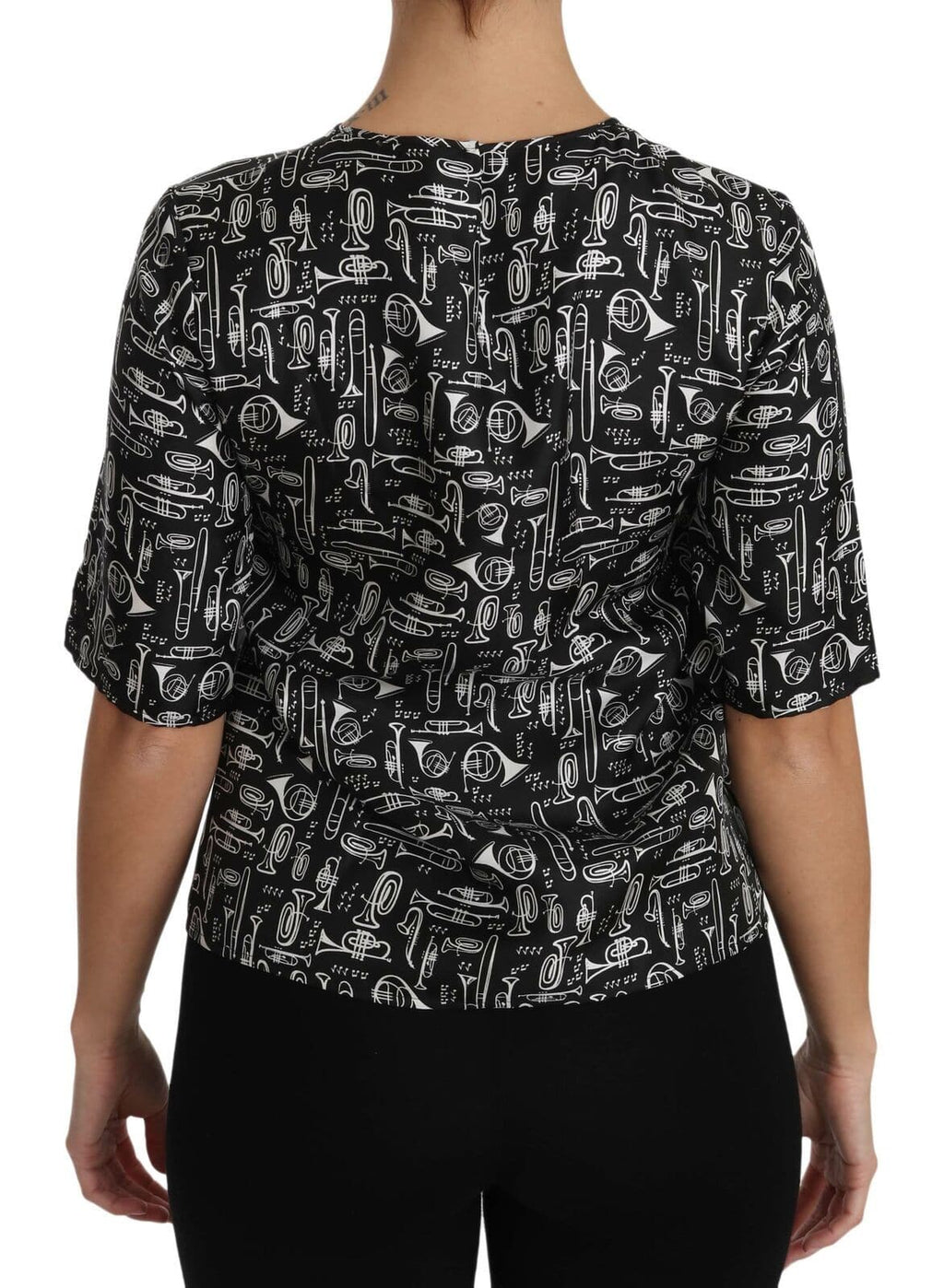 Chemisier en soie noir Dolce & Gabbana avec motif d'instruments de musique, style élégant et sophistiqué.