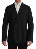 Veste blazer en coton noir à pois blancs de Dolce & Gabbana, élégante et moderne, portée sur un mannequin.