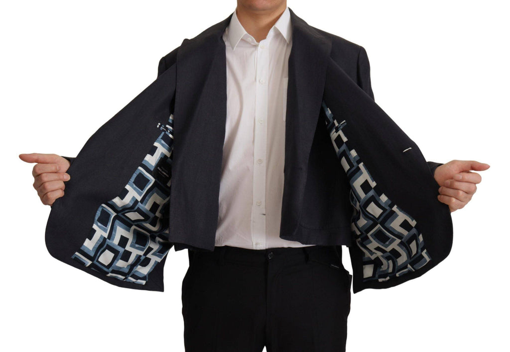 Blazer homme en lin bleu de la marque Dolce & Gabbana, veste formelle élégante avec coupe classique.