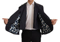 Blazer homme en lin bleu de la marque Dolce & Gabbana, veste formelle élégante avec coupe classique.