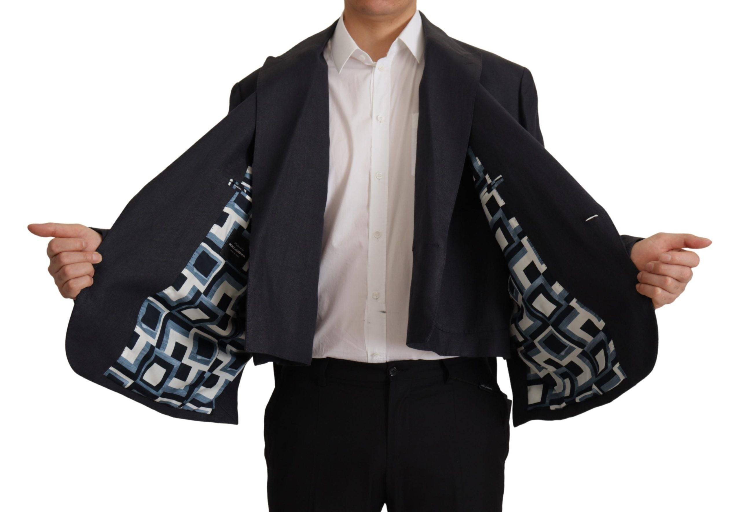 Blazer homme en lin bleu de la marque Dolce & Gabbana, veste formelle élégante avec coupe classique.