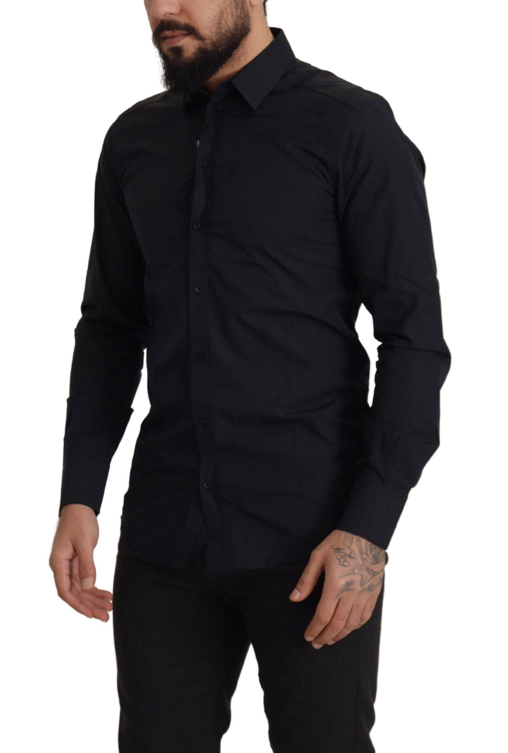 Chemise slim noire en coton Dolce & Gabbana avec détails dorés, vue de face sur un fond neutre.