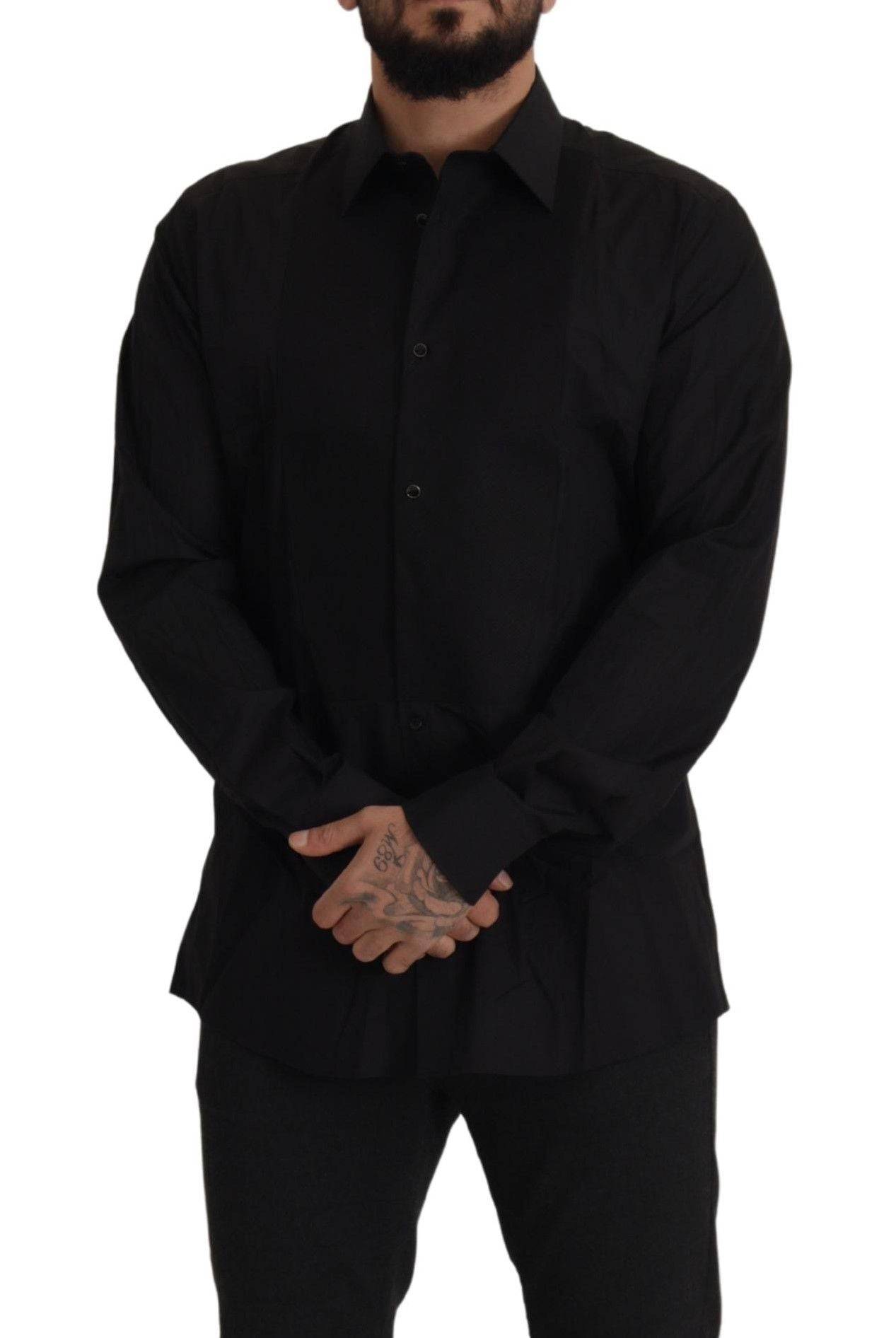 Chemise de smoking noire Dolce & Gabbana, coupe slim fit, ornement doré, élégante chemise pour occasions formelles.
