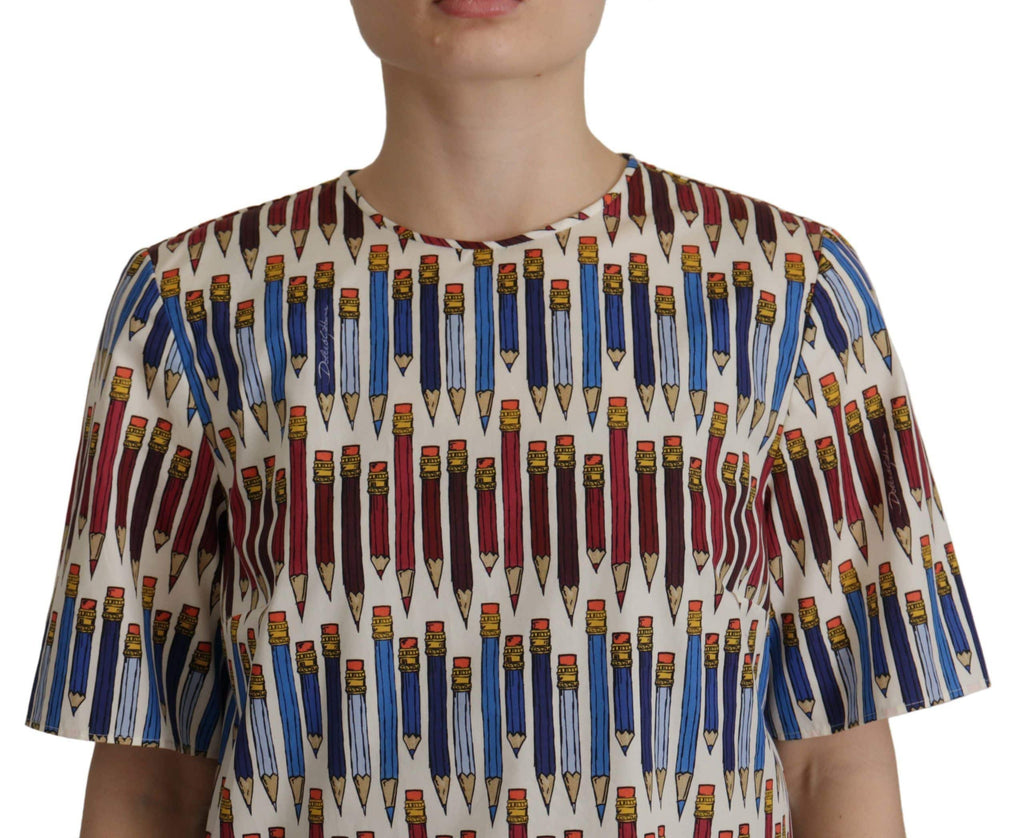 T-shirt blanc Dolce & Gabbana avec imprimé crayon en coton, ajusté et élégant, porté comme une blouse.