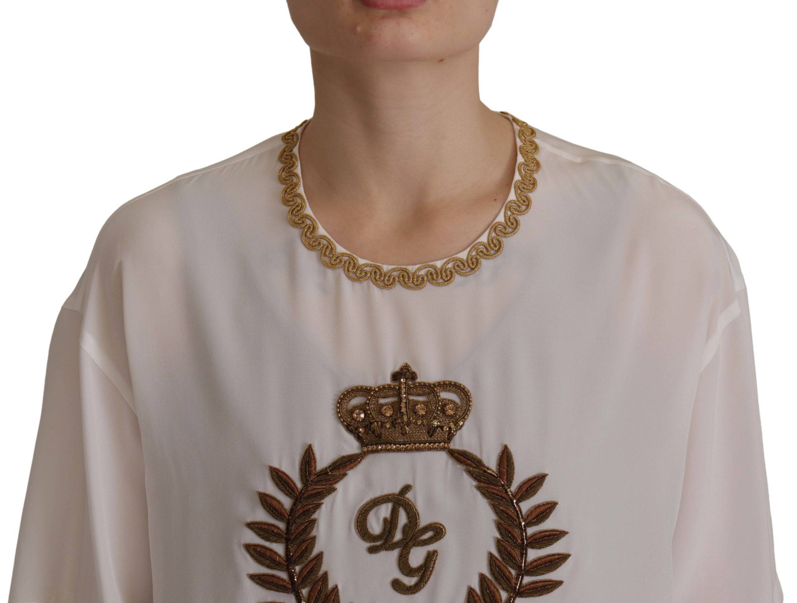 Chemise en soie blanche Dolce & Gabbana avec couronne en or et cristaux, élégante haut de blouse.