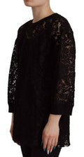 Pull Dolce & Gabbana en dentelle florale noire, style blouse Sicily, avec détails élégants et tissu délicat visible sur l’image.