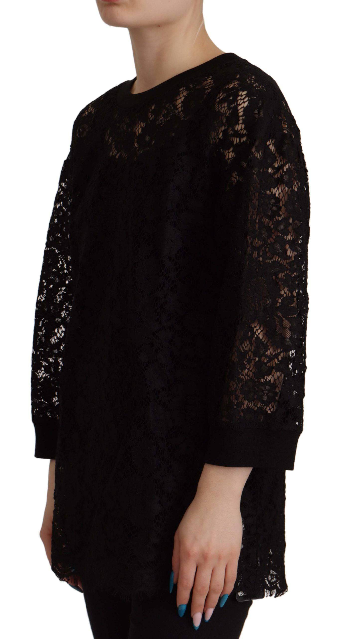 Pull Dolce & Gabbana en dentelle florale noire, style blouse Sicily, avec détails élégants et tissu délicat visible sur l’image.