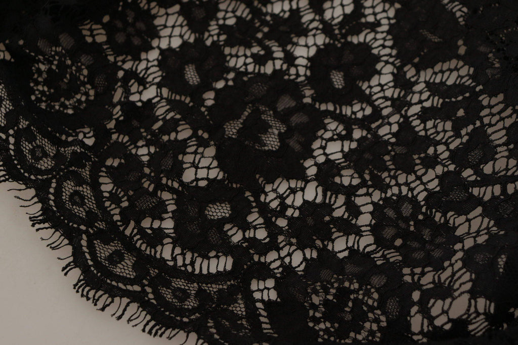 Pull Dolce & Gabbana en dentelle florale noire, style blouse Sicily, avec détails délicats et finition élégante.