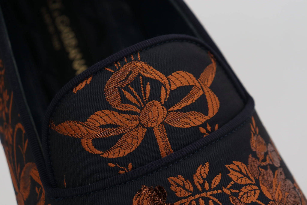 Chaussures Dolce & Gabbana, slippers ou loafers bleus avec motif floral rust, semelles en cuir, pour femmes.
