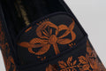 Chaussures Dolce & Gabbana, slippers ou loafers bleus avec motif floral rust, semelles en cuir, pour femmes.