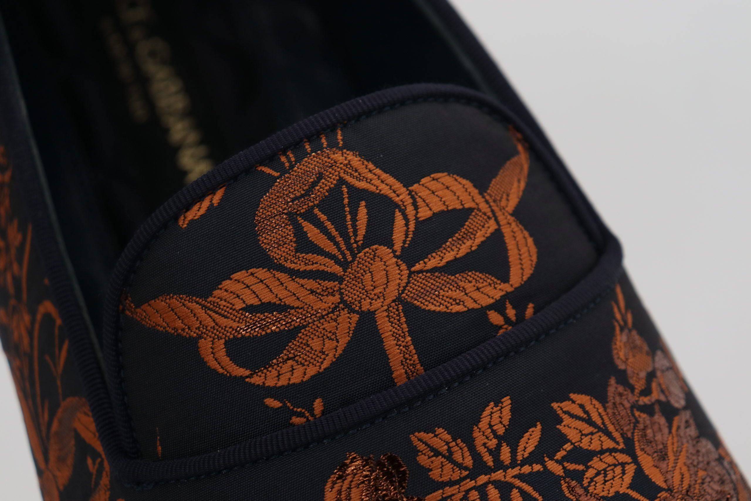 Chaussures Dolce & Gabbana, slippers ou loafers bleus avec motif floral rust, semelles en cuir, pour femmes.