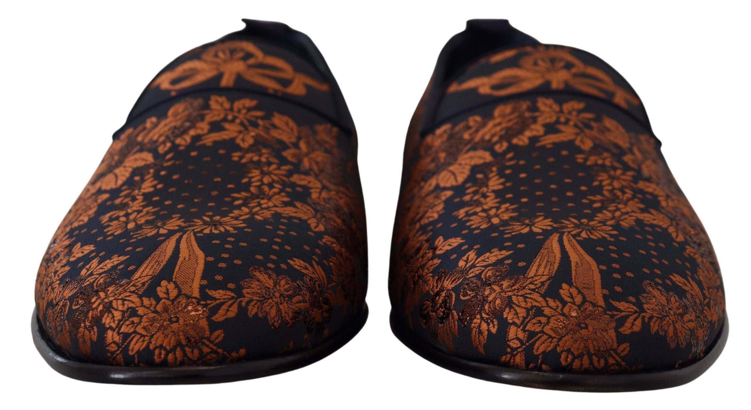Chaussures Dolce & Gabbana en velours bleu avec motif floral rust, slippers ou loafers élégants pour femme.