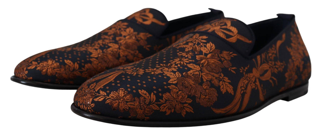 Chaussures Dolce & Gabbana slippers en toile bleue avec motifs floraux rust, chaussures décontractées élégantes pour femme.