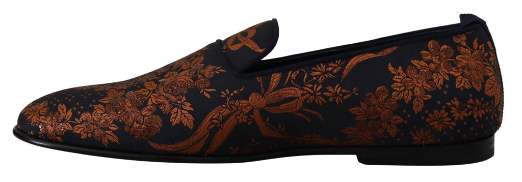 Chaussures Dolce & Gabbana, slippers en toile bleue avec motifs floraux rouillés, style loafers élégants pour femmes.