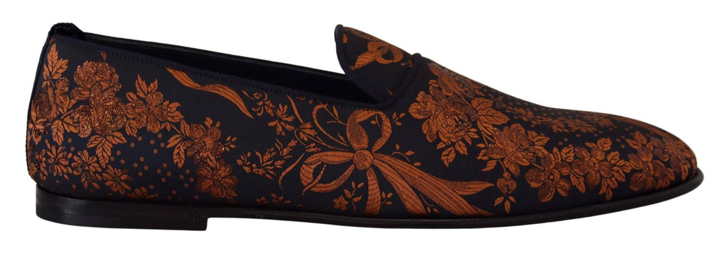 Chaussures Dolce & Gabbana slippers mocassins bleu rouille à motifs floraux, en toile avec semelle en caoutchouc.