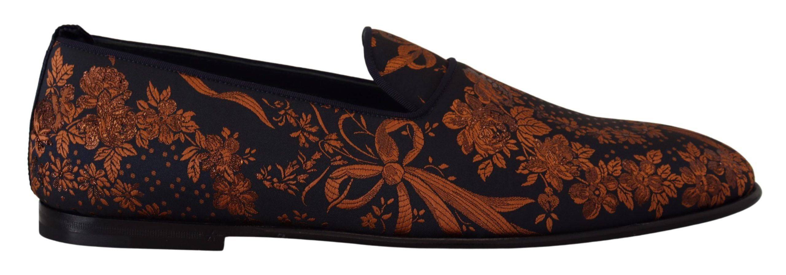 Chaussures Dolce & Gabbana slippers mocassins bleu rouille à motifs floraux, en toile avec semelle en caoutchouc.