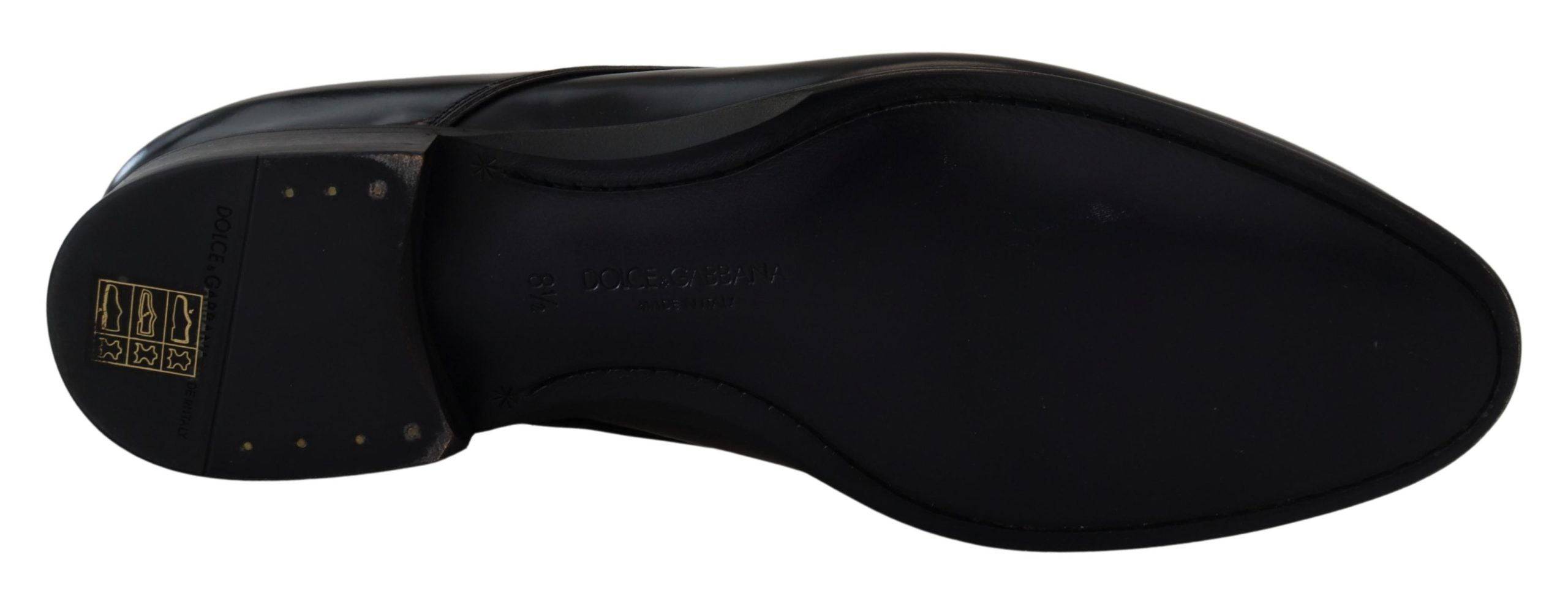 Chaussures de ville en cuir noir Dolce & Gabbana pour homme, élégantes et raffinées, avec lacets et finition soignée.