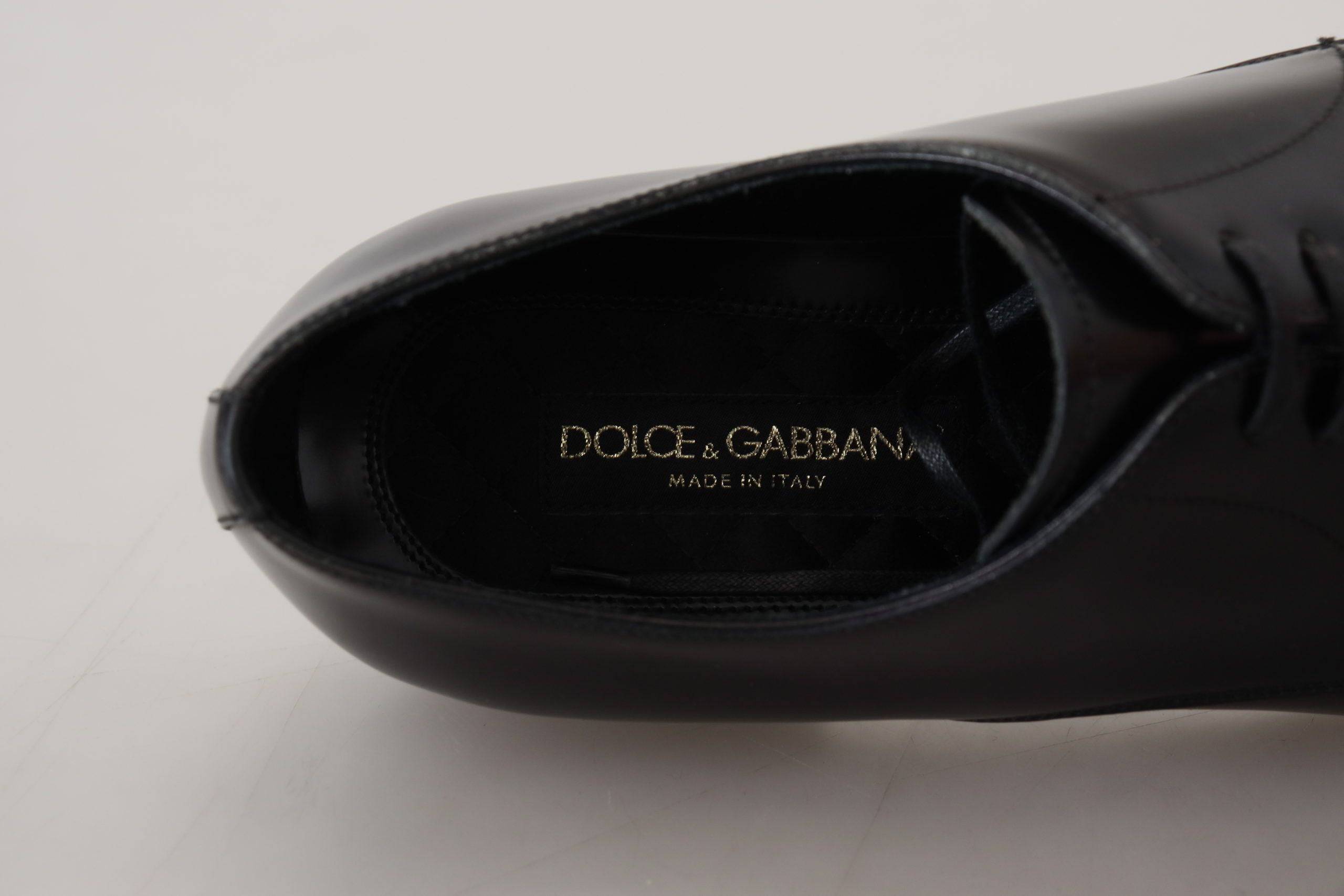 Chaussures formelles en cuir noir de marque Dolce & Gabbana, élégantes et raffinées pour homme.