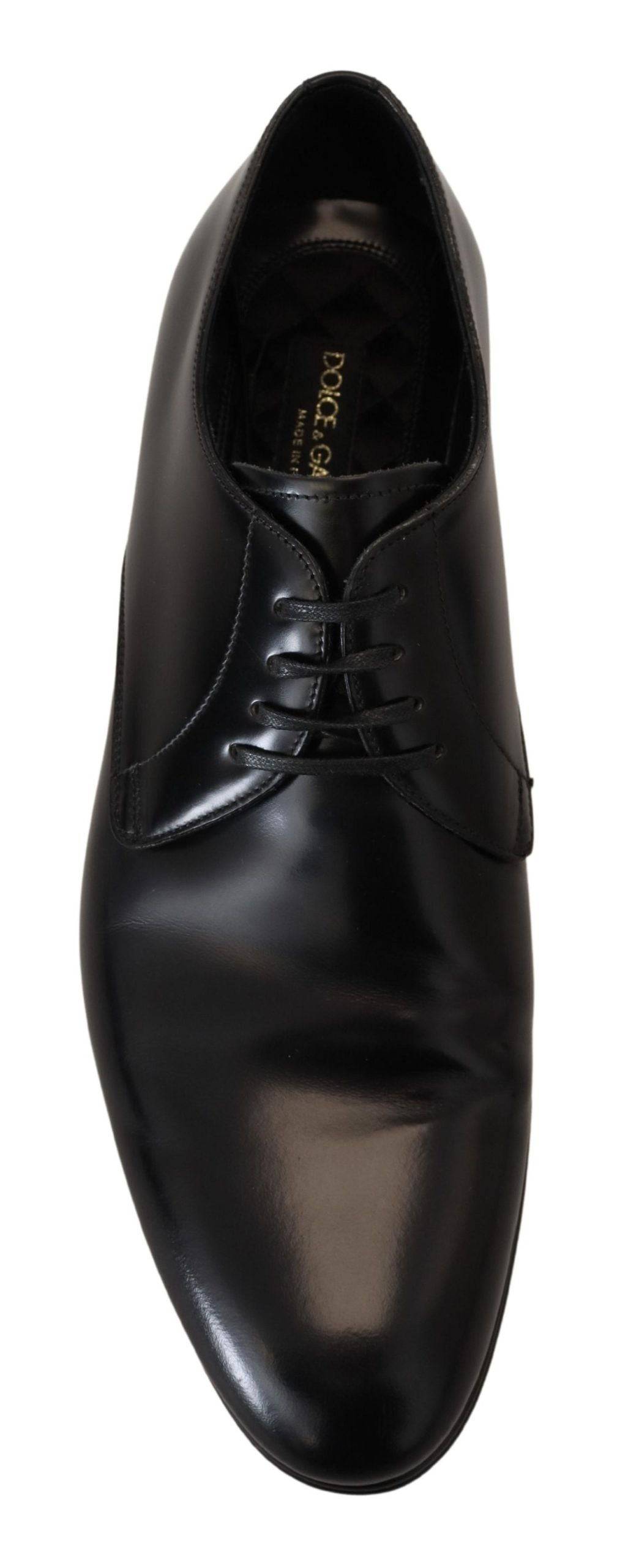 Chaussures de ville en cuir noir Dolce & Gabbana pour homme, élégantes et formelles, avec finition soignée.