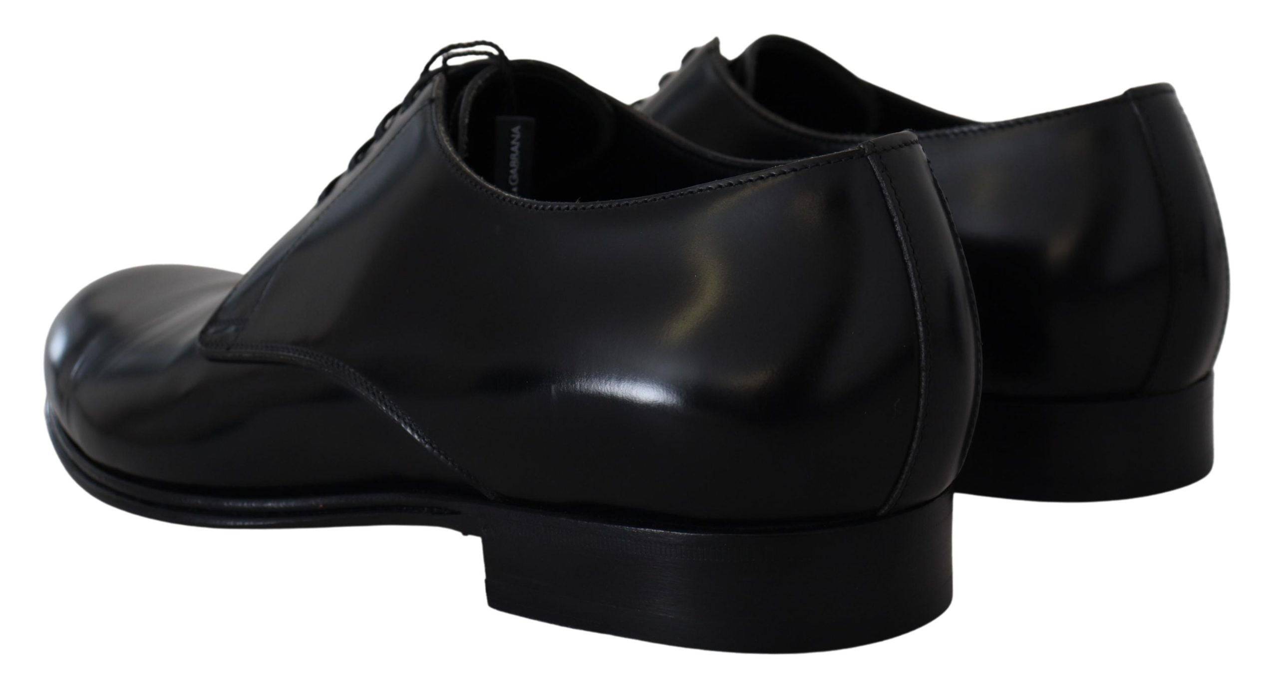 Chaussures formelles en cuir noir Dolce & Gabbana pour homme, élégantes et sophistiquées, visibles en gros plan.