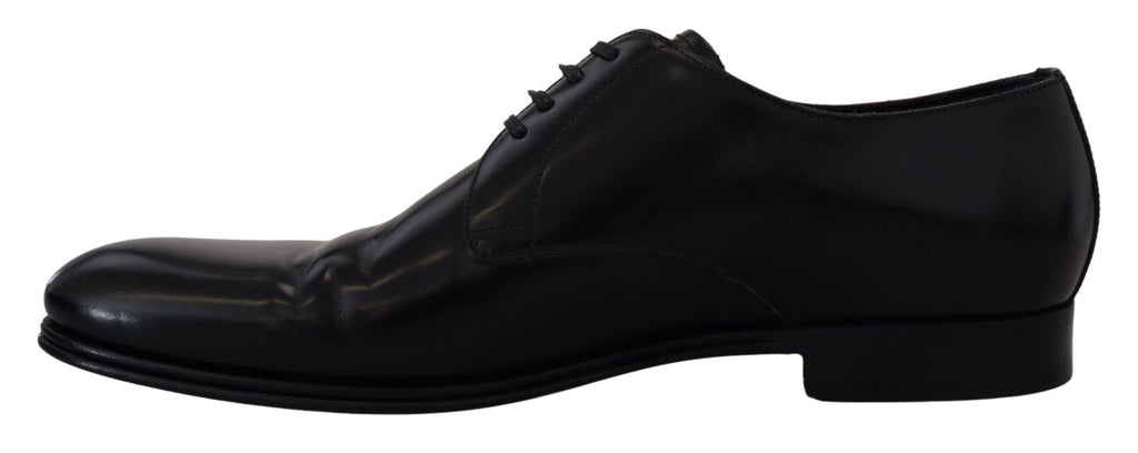 Chaussures formelles en cuir noir de Dolce & Gabbana, élégantes et sophistiquées pour homme.