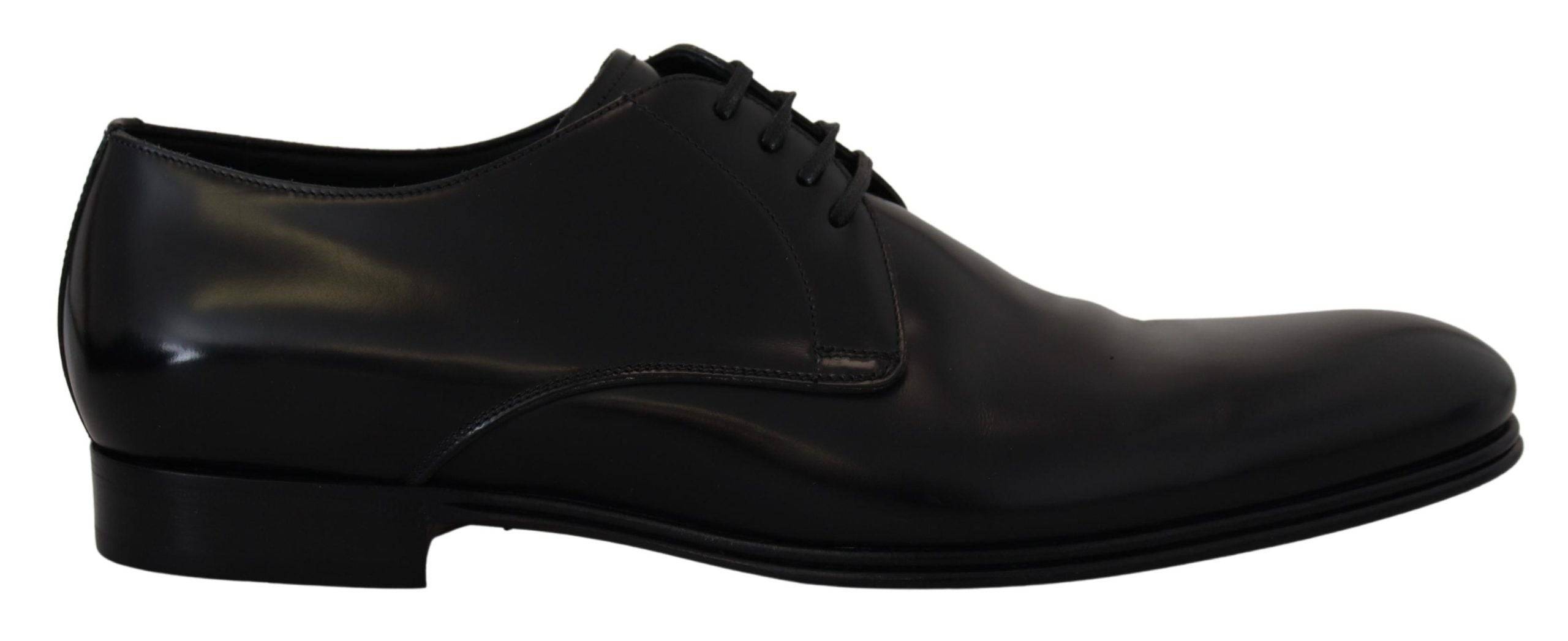 Chaussures habillées en cuir noir Dolce & Gabbana pour homme, élégantes, avec finition soignée et semelle en cuir.
