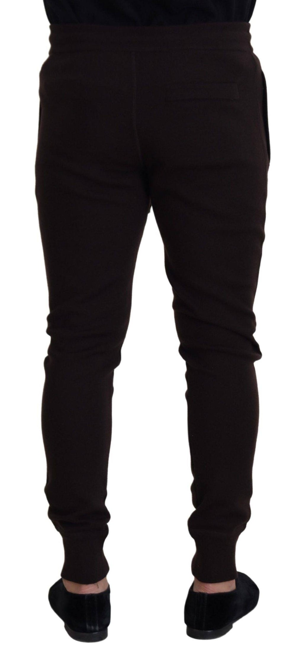 Pantalons en cachemire marron Dolce & Gabbana avec cordon de serrage et coupe élégante, visibles sur l'image.