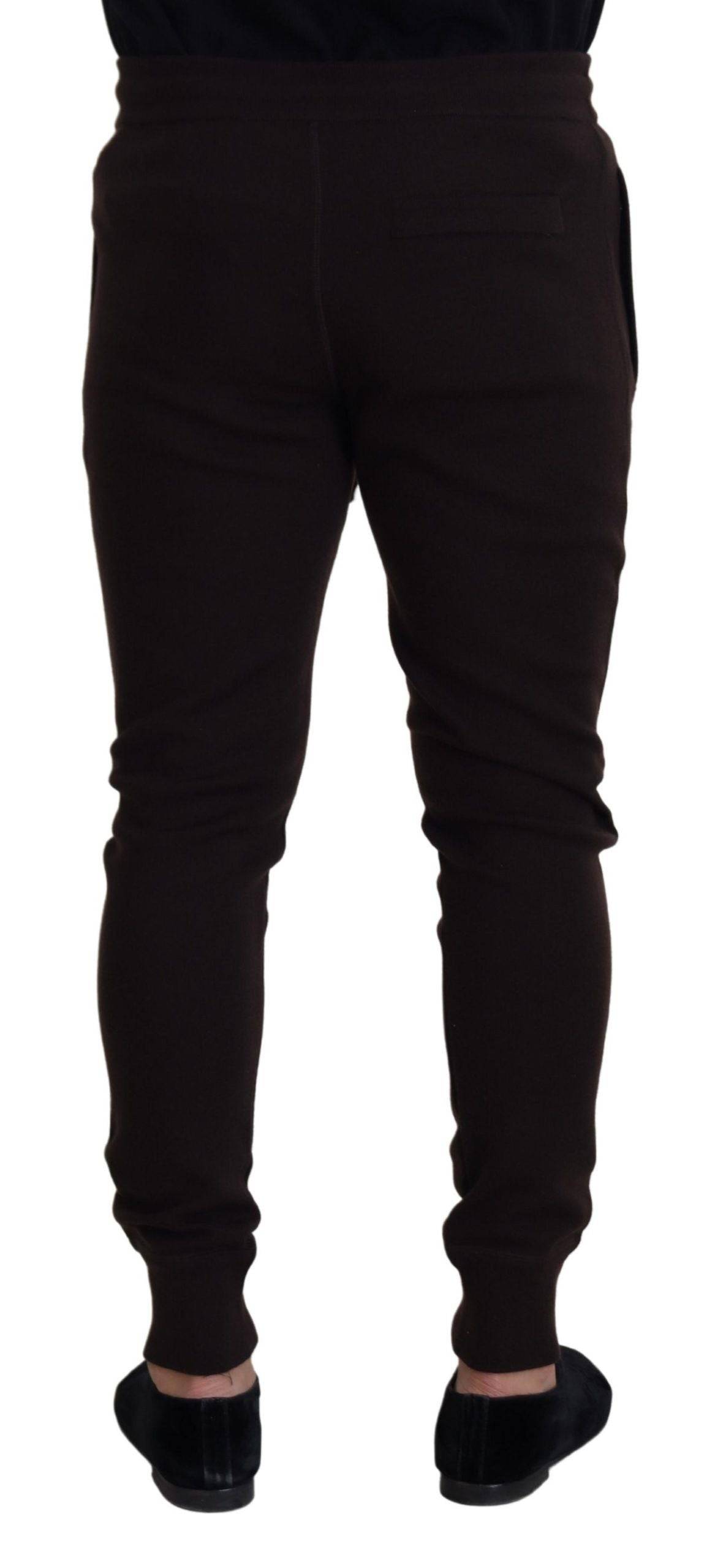 Pantalons en cachemire marron Dolce & Gabbana avec cordon de serrage et coupe élégante, visibles sur l'image.