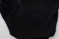 Pull à col rond en laine noire Dolce & Gabbana avec motif logo, doux et élégant, pour un style sophistiqué et confortable.