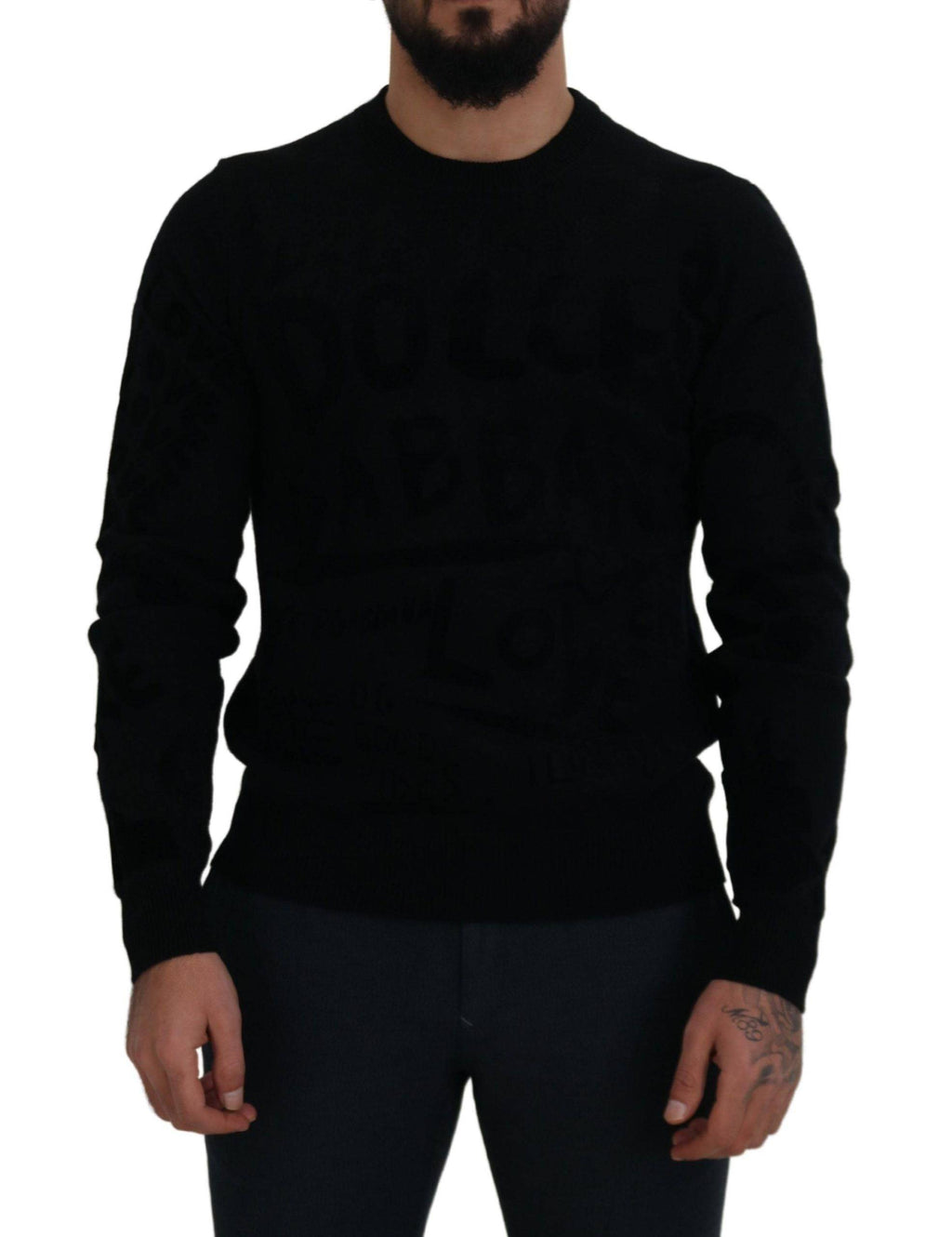 Pull en laine noir Dolce & Gabbana à logo, col rond et motif élégant, portée décontractée.
