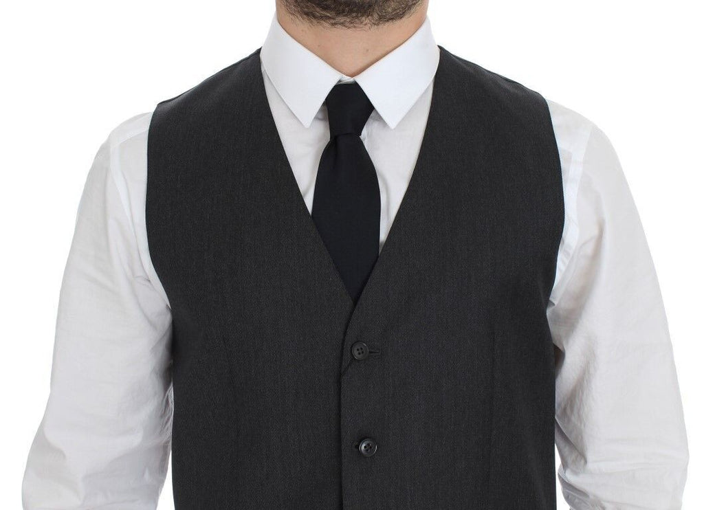 Gilet en laine gris de costume Dolce & Gabbana, veste formelle élégante pour homme, détails sophistiqués et coupe moderne.