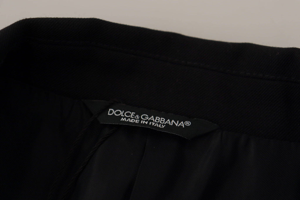 Blazer noir double boutonnage Dolce & Gabbana, veste élégante en tissu sophistiqué, vue de face sur fond neutre.