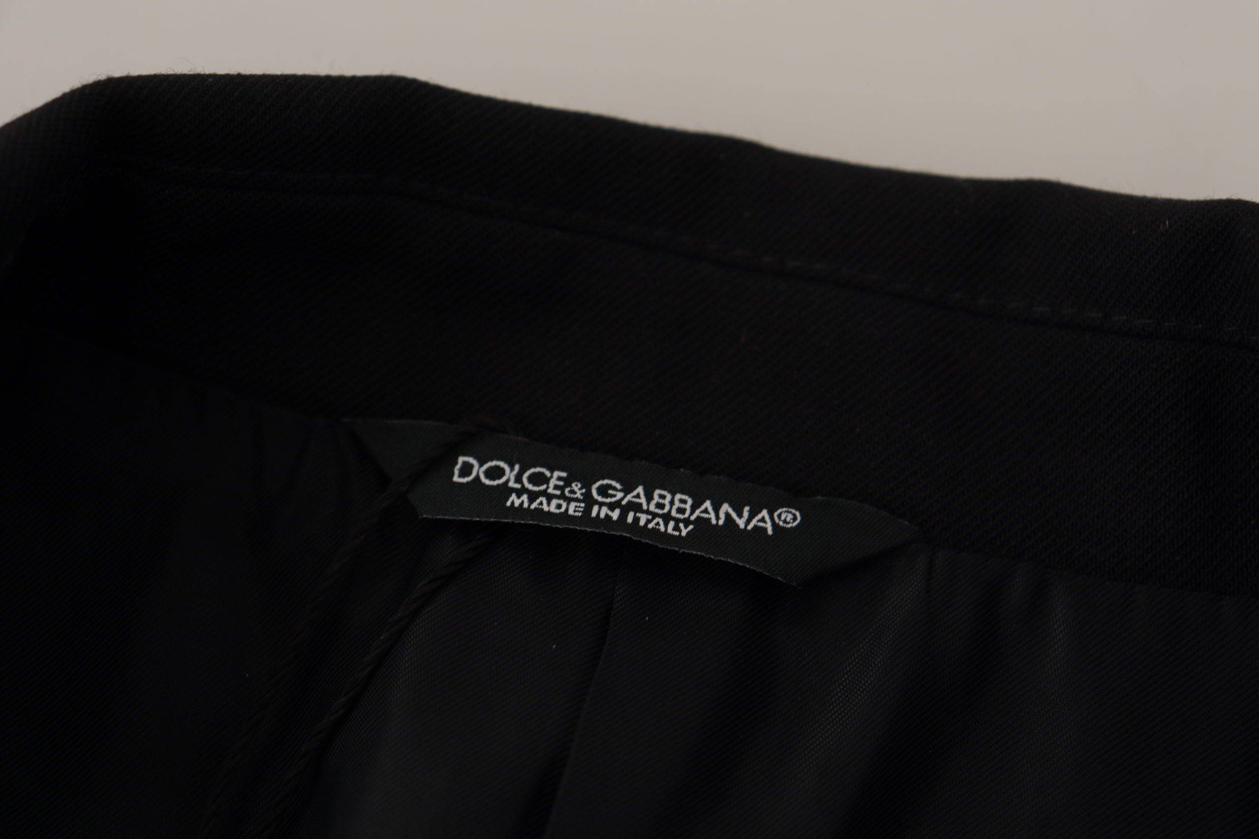 Blazer noir double boutonnage Dolce & Gabbana, veste élégante en tissu sophistiqué, vue de face sur fond neutre.