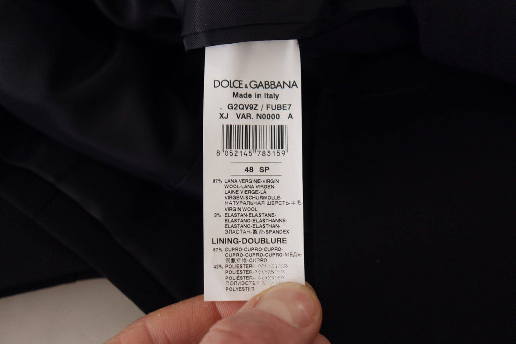Veste blazer noire à double boutonnage Dolce & Gabbana, élégant manteau pour femme avec coupe sophistiquée et détails raffinés.