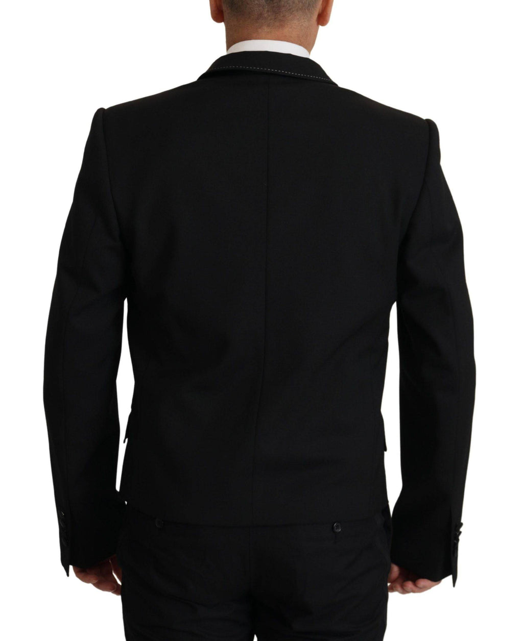 Blazer noir Dolce & Gabbana à double boutonnage, style élégant avec col cranté et boutons en métal.
