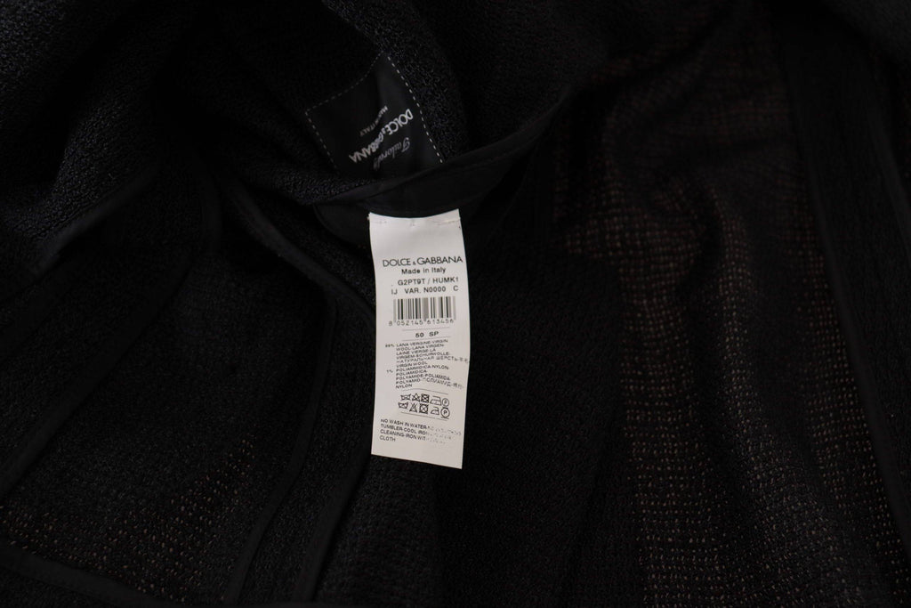Manteau noir à un seul boutonnage de la marque Dolce & Gabbana, blazer pour homme, vue de face sur un fond blanc.