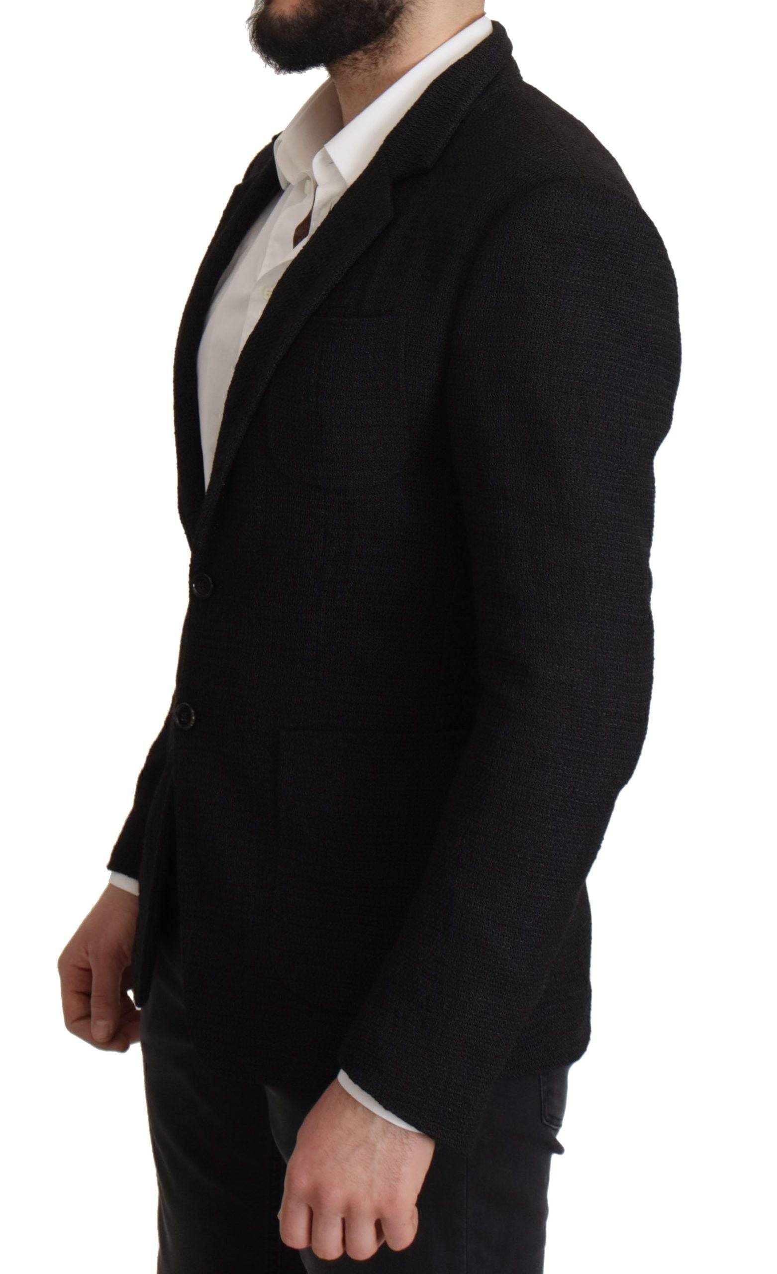 Manteau noir Dolce & Gabbana pour homme, blazer à un bouton, coupe classique, en tissu élégant, porté sur un mannequin.