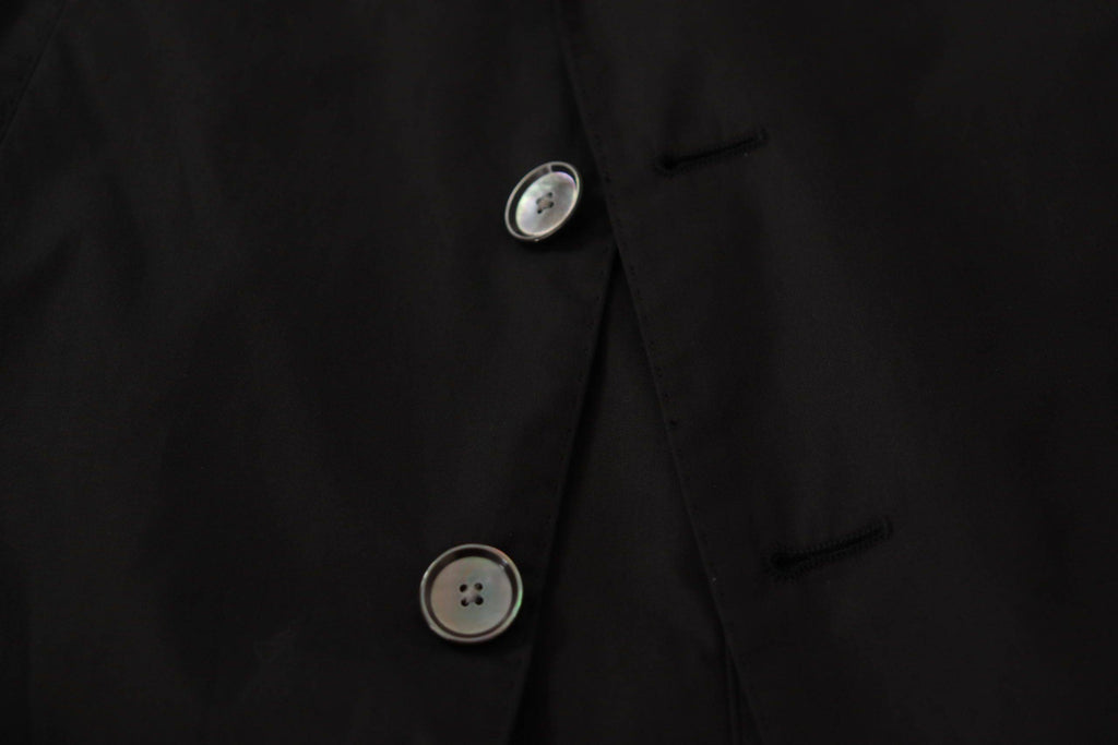 Blazer noir Dolce & Gabbana en tissu à simple boutonnage, coupe élégante et classique, vue de face sur mannequin.