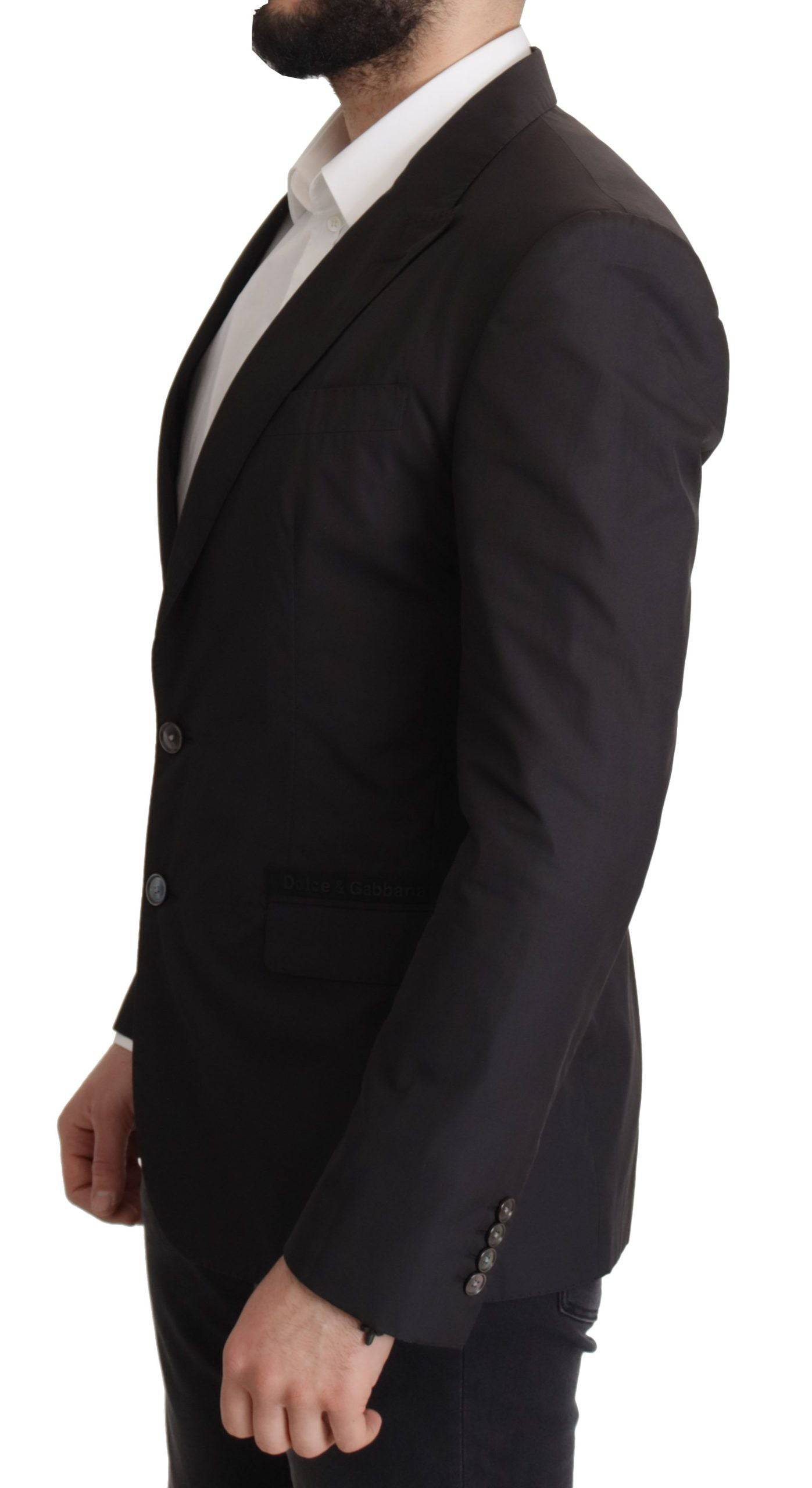 Blazer noir à un bouton Dolce & Gabbana Taormina, coupe classique et élégante, en tissu texturé.