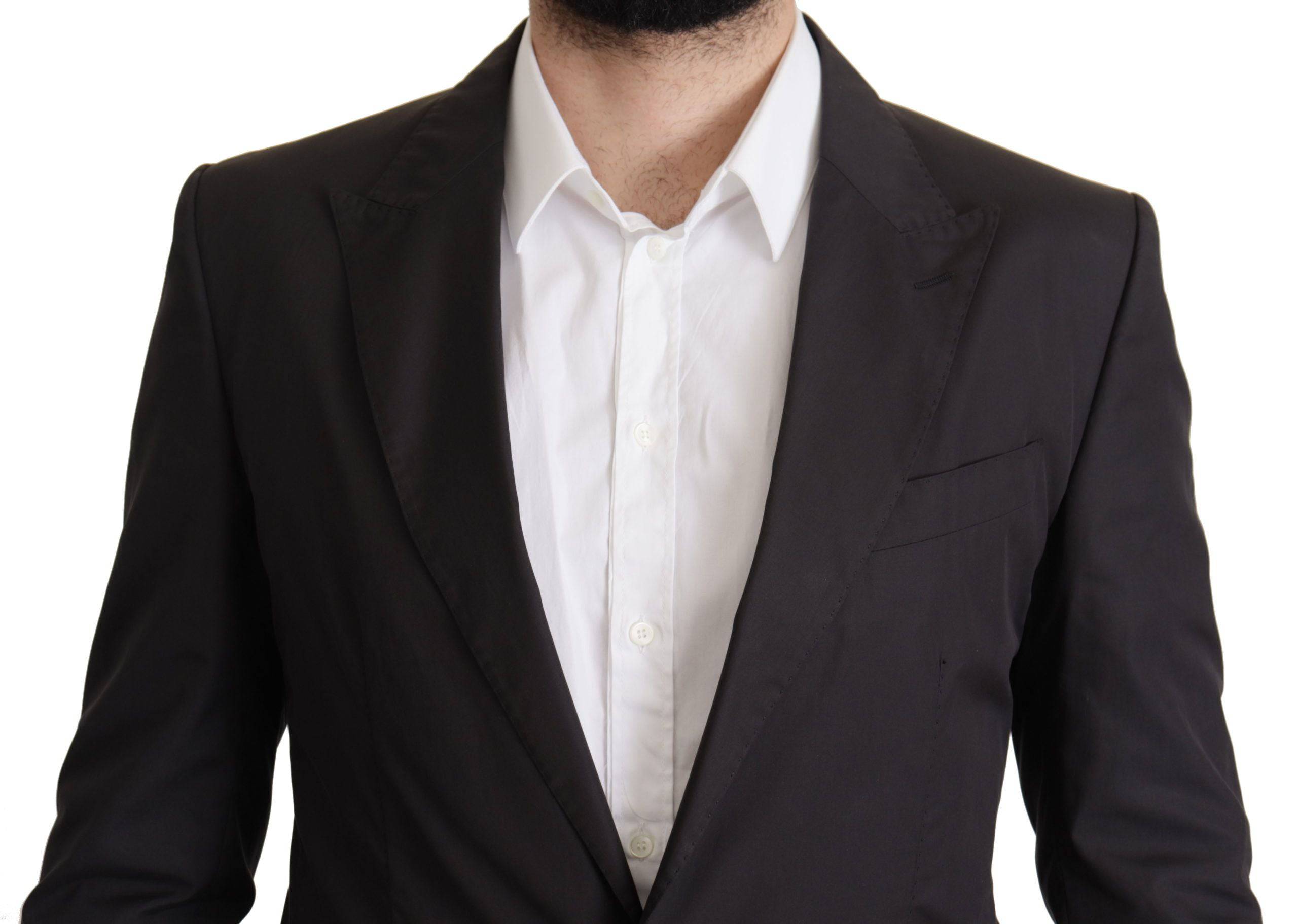 Veste blazer noire à un seul bouton Dolce & Gabbana Taormina, coupe élégante et moderne, visible en détail sur l'image.