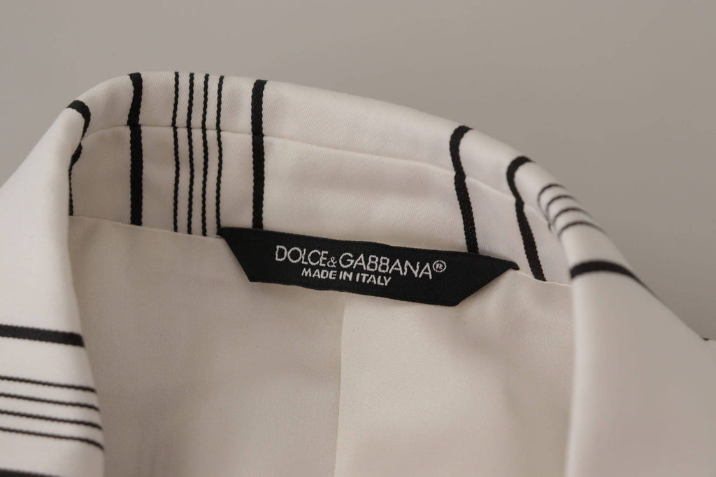 Blazer blanc à rayures en coton Dolce & Gabbana, coupe classique à un bouton, détails élégants et tissu léger.