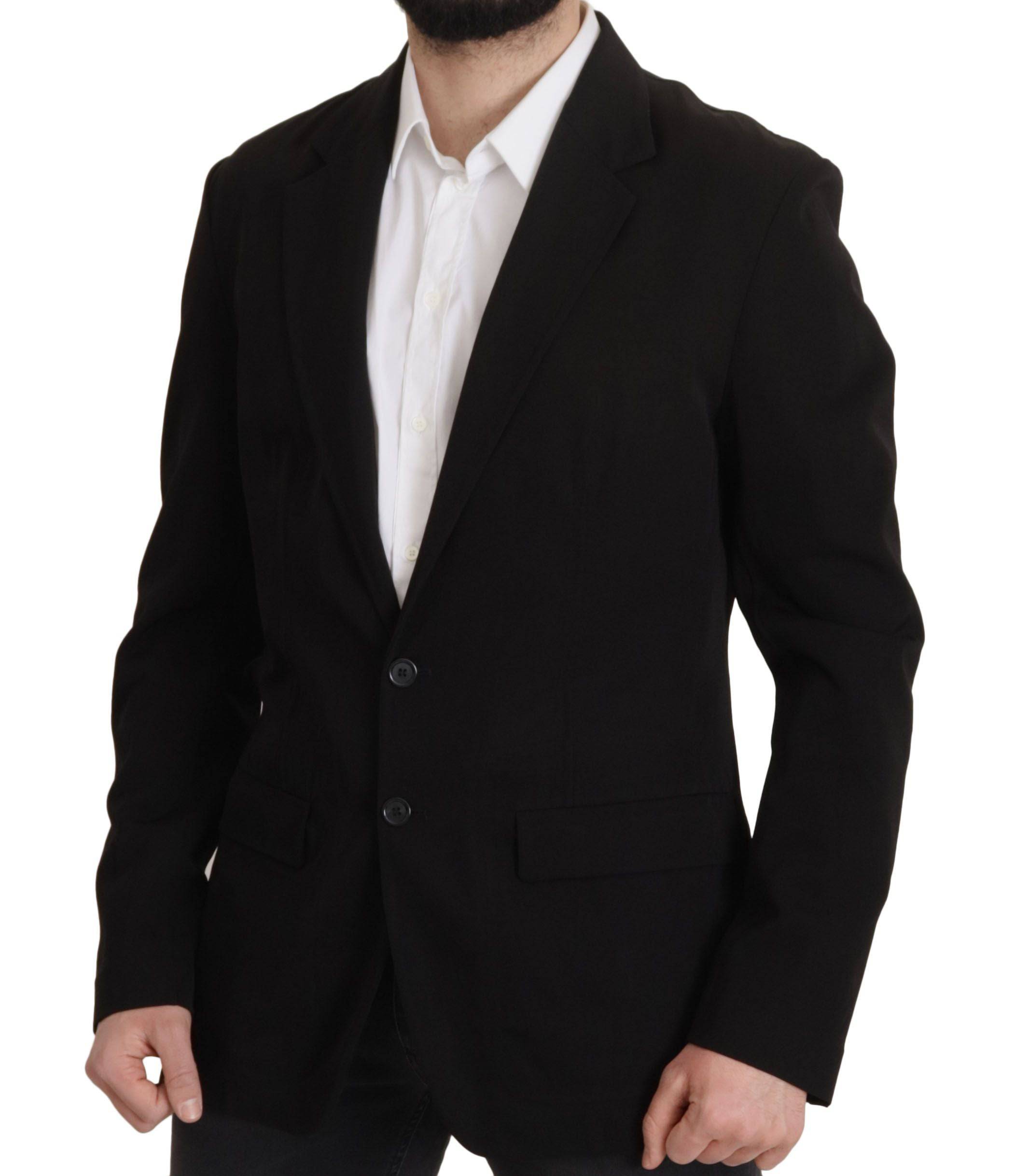 Manteau blazer en laine noire Dolce & Gabbana, coupe croisée simple, élégant et sophistiqué, porté sur un mannequin.