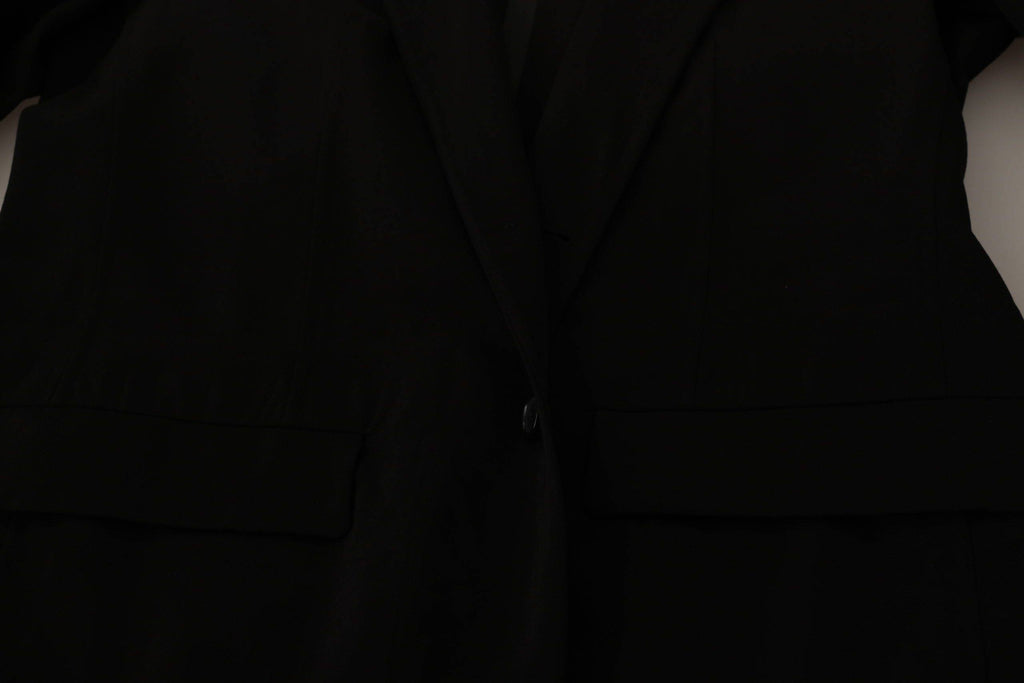 Manteau blazer en laine noire à un seul boutonnage de Dolce & Gabbana, coupe élégante et moderne, porté sur un mannequin.