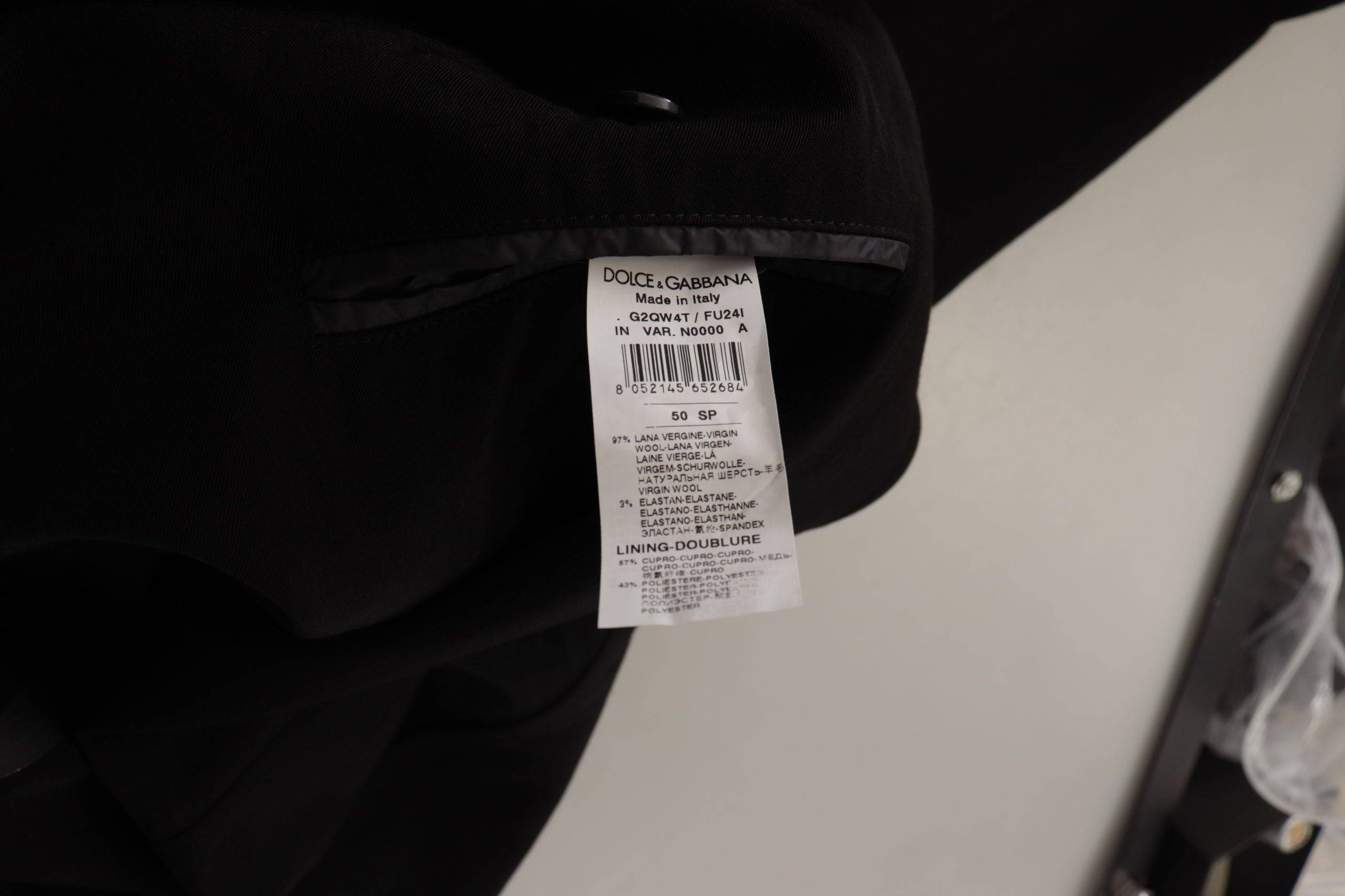 Manteau blazer noir en laine à simple boutonnage de Dolce & Gabbana, veste élégante avec col classique et poches latérales.