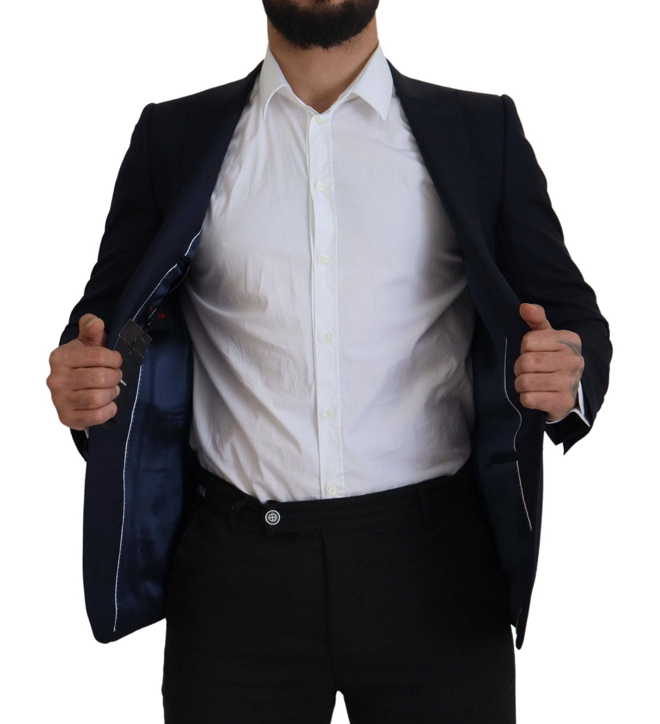 Manteau blazer en laine bleue Dolce & Gabbana à boutonnière simple, vue en gros plan sur le tissu et la coupe élégante.