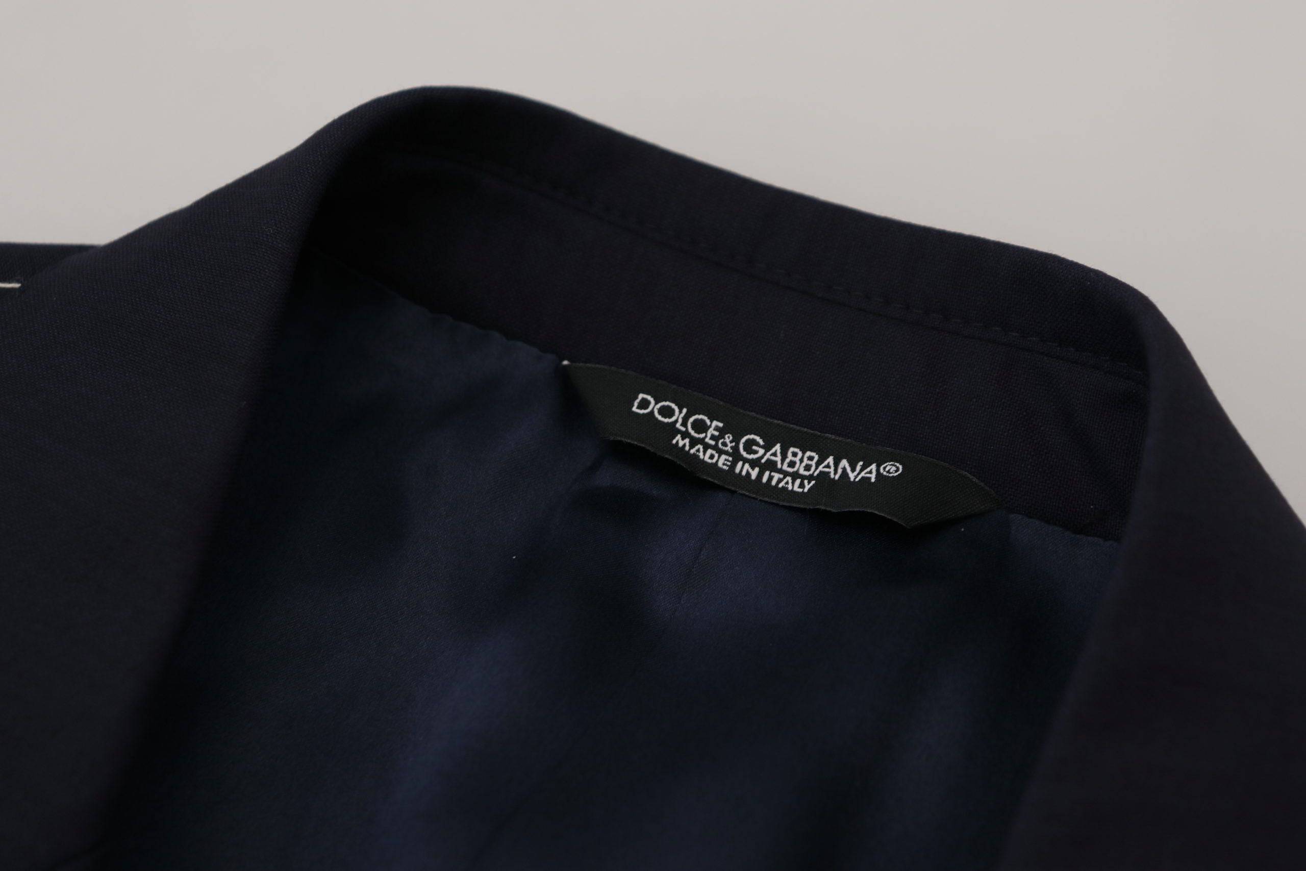 Manteau blazer bleu en laine Dolce & Gabbana à un bouton, coupe classique, porté sur un mannequin.