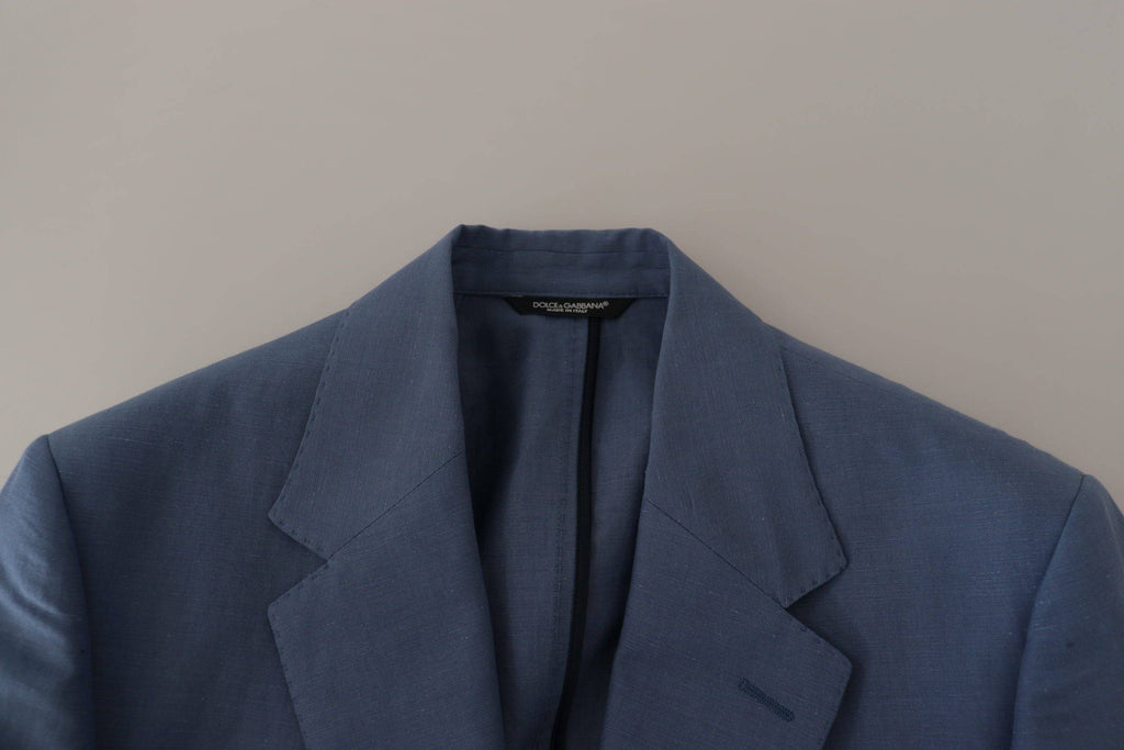 Blazer bleu Dolce & Gabbana à un seul bouton avec logo, veste élégante en tissu, vue de face sur fond blanc.