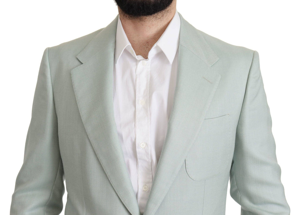Veste blazer en cachemire vert de Dolce & Gabbana, élégante et sophistiquée, visible en gros plan sur l'image.