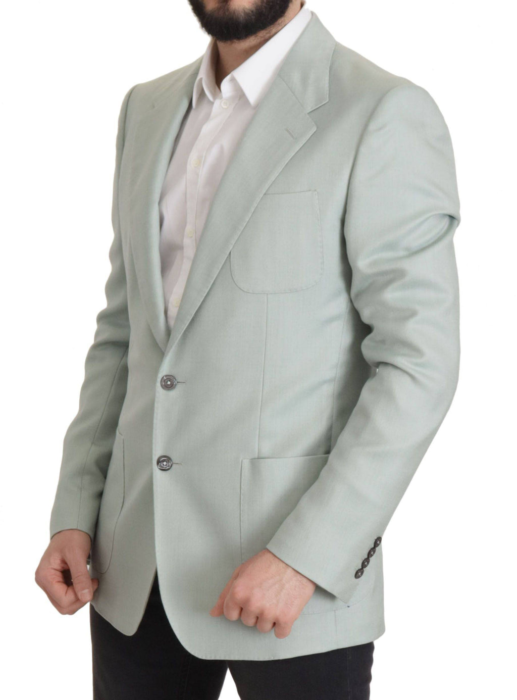 Veste blazer en cachemire vert de Dolce & Gabbana, élégante et sophistiquée, portée sur un fond neutre.